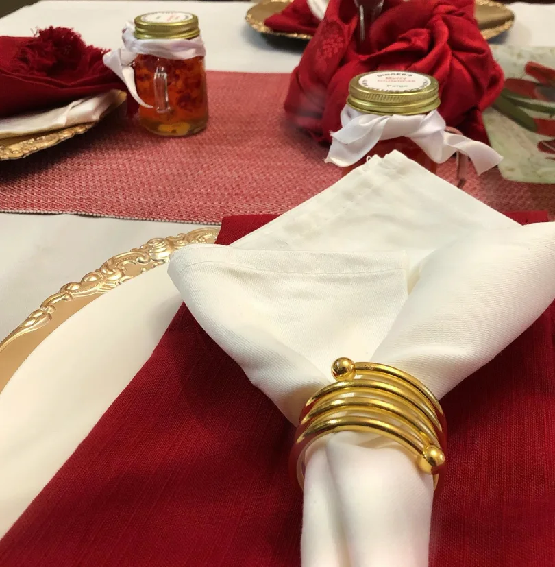 Elegant table setting with Ginger's Jams jar favors